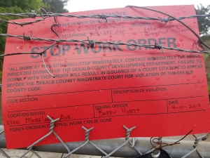 DeKalb County slapped a stop work order on a site owned by Crown Enterprises